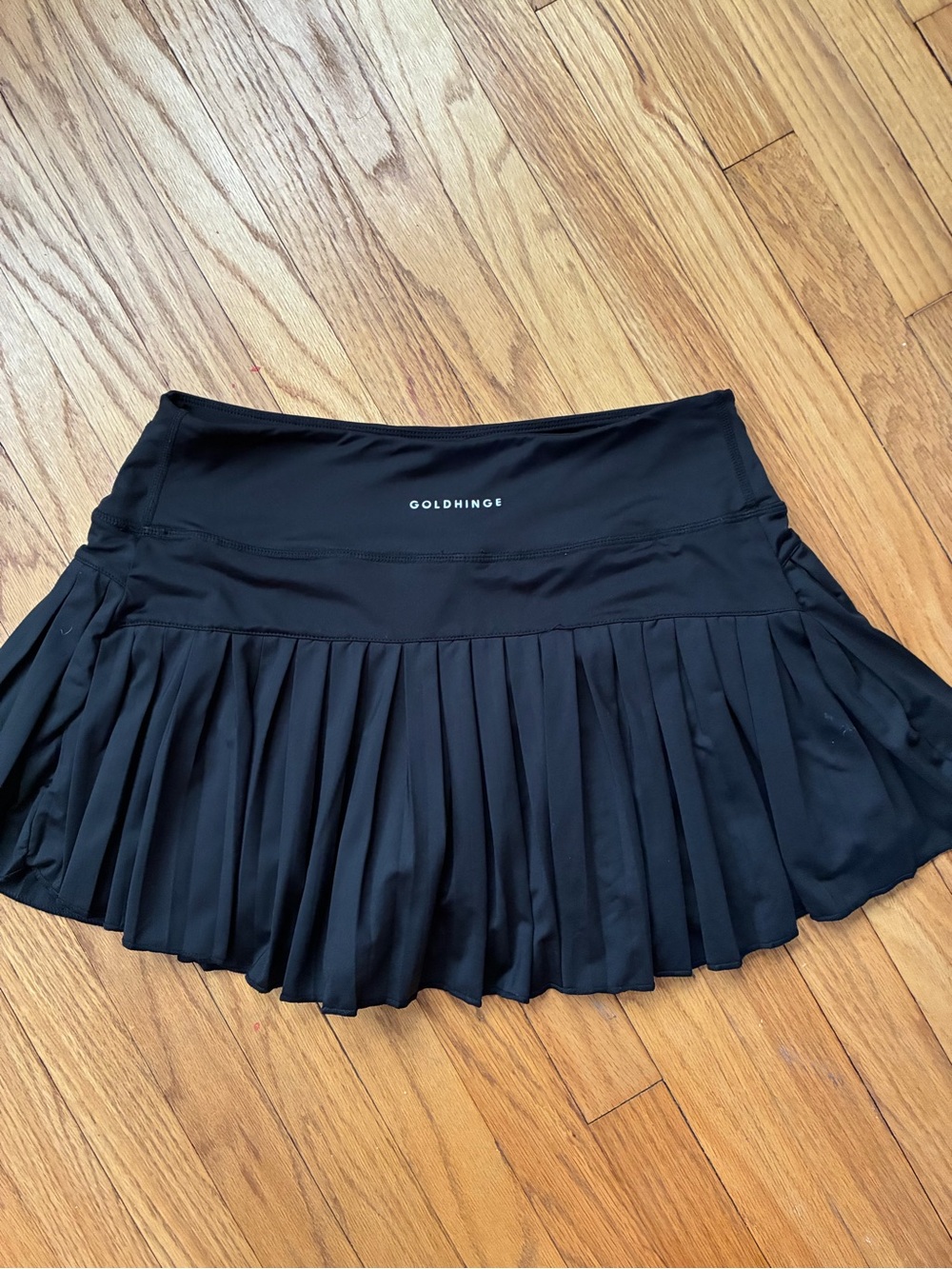 GoldHinge black pleated skort
